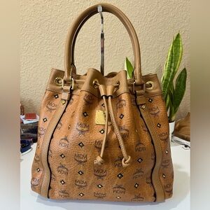 MCM COGNAC DRAWSTRING STUDDED HANDBAG